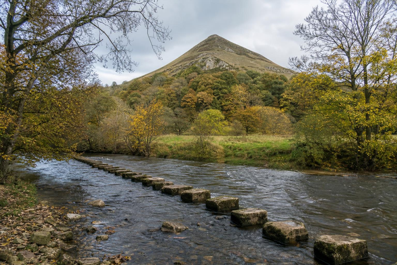 River Dove stepping stones beneath Thorpe Cloud hill